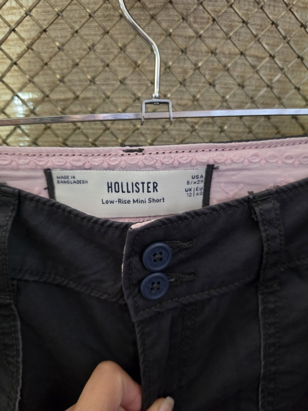Hollister Low-Rise Mini Shorts — Black with Pink Trim